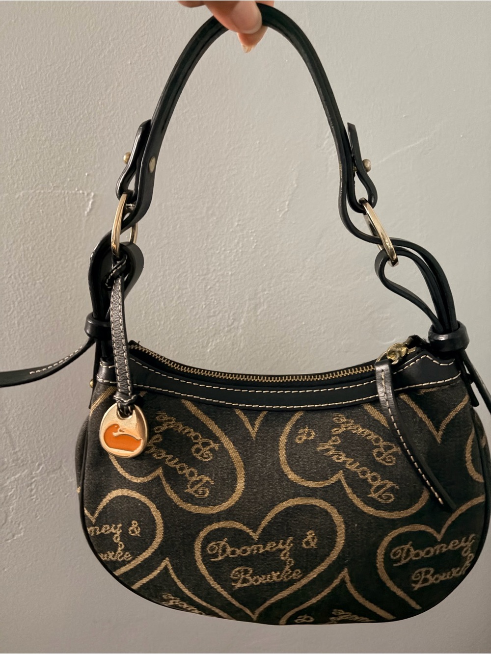 Dooney & Bourke Black and Gold Heart Logo Hobo Shoulder Bag